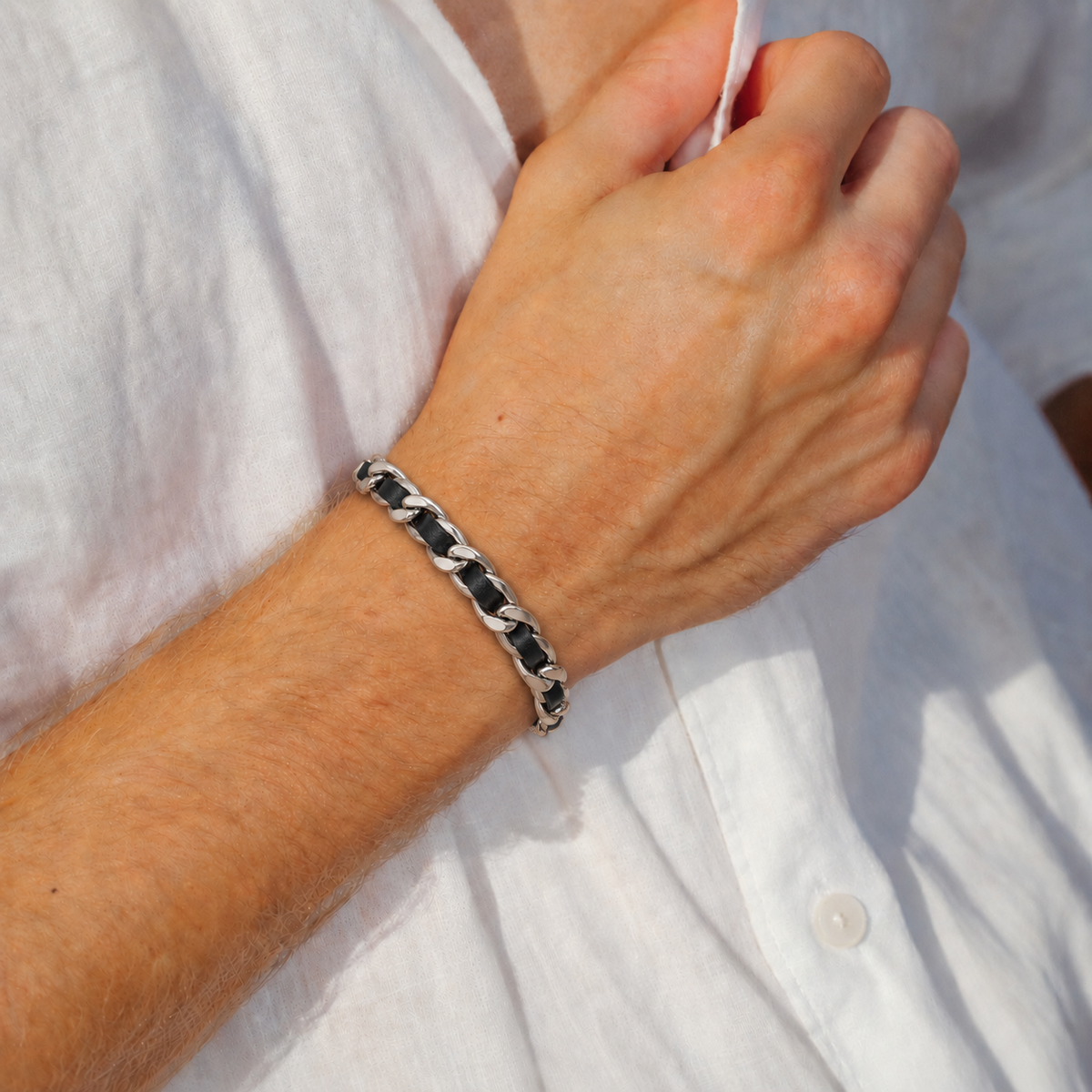 Men's Cuban Leather Bracelet styled with a white shirt for a modern casual look