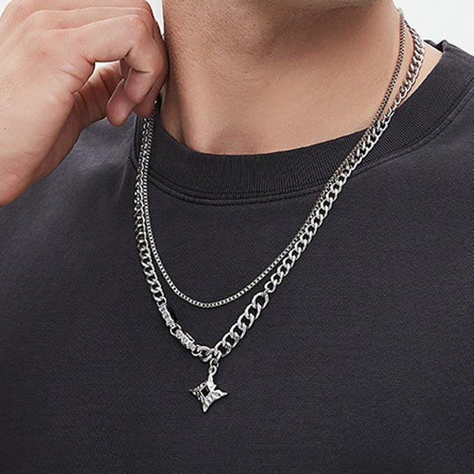 Men's Starburst Layered Necklace worn with a black T-shirt showing its double chain design