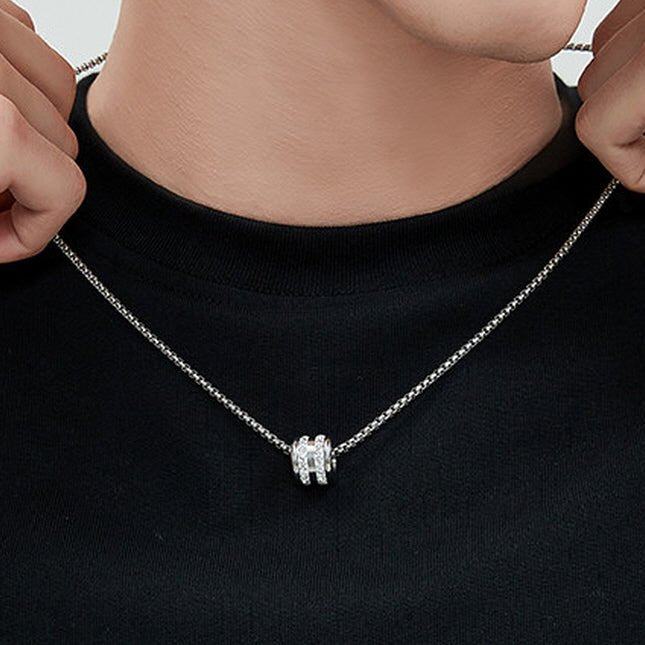 Men's Pavé Barrel Necklace worn with a black shirt for a minimalist everyday look