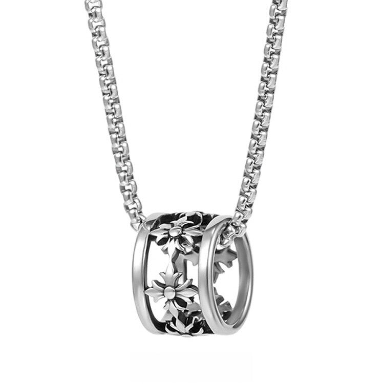 Iris Bead Necklace featuring a detailed silver-tone engraved barrel bead pendant