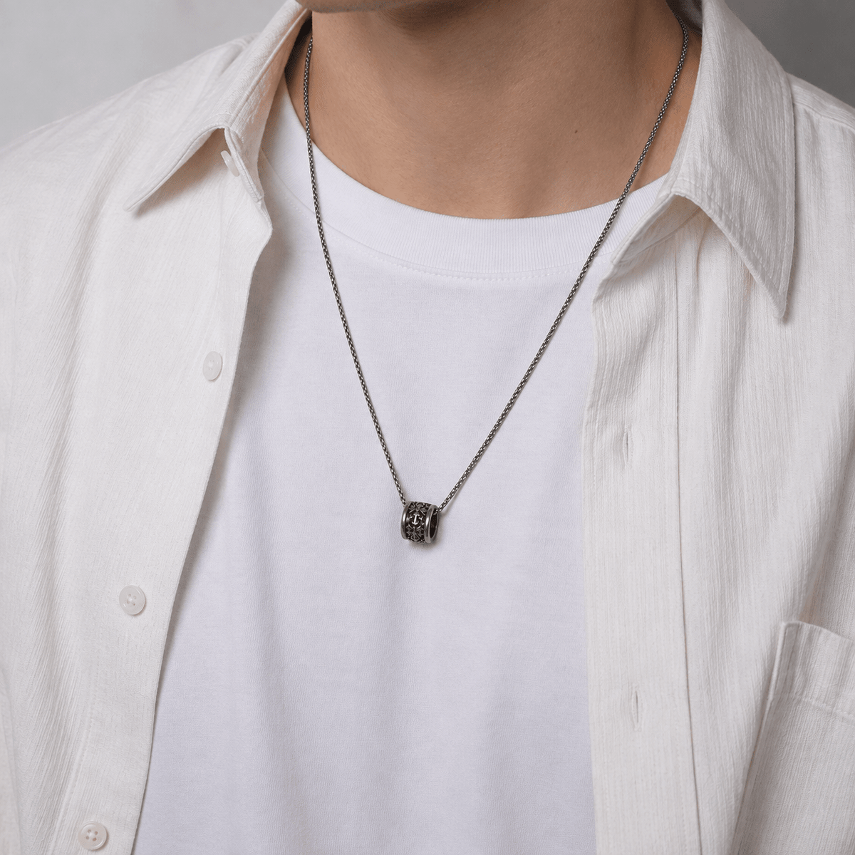 Men's Iris Bead Necklace worn with a white shirt for a clean, minimalist style