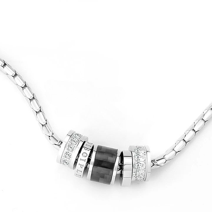 Barrel Accent Necklace featuring silver-tone cylindrical barrel accents and chain design