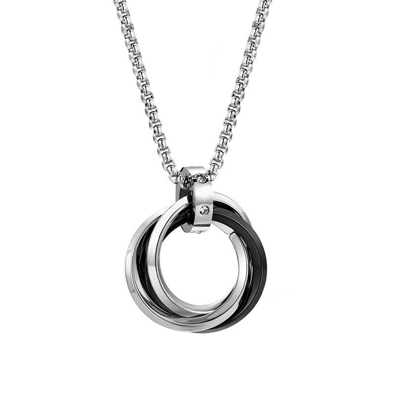 Interlocking Ring Necklace with polished silver-tone circular pendant and chain on white background