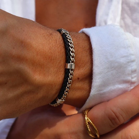 Men's Forge Leather Bracelet worn on wrist featuring black braided leather and silver-tone accents