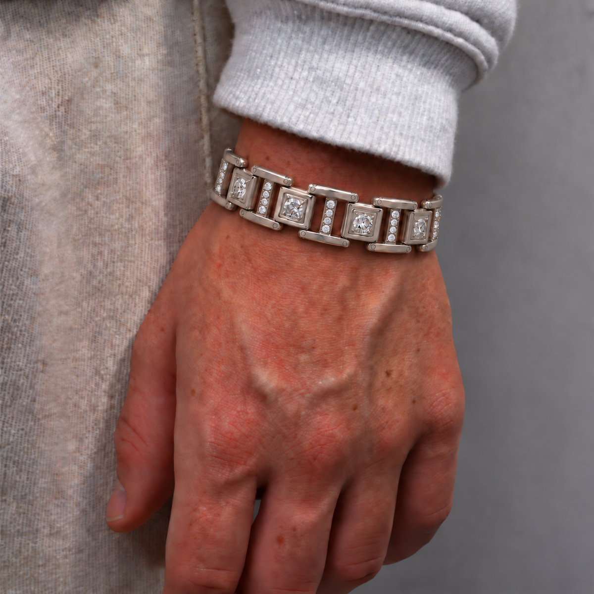 Men's Prism Link Bracelet worn on wrist featuring polished silver-tone rectangular links