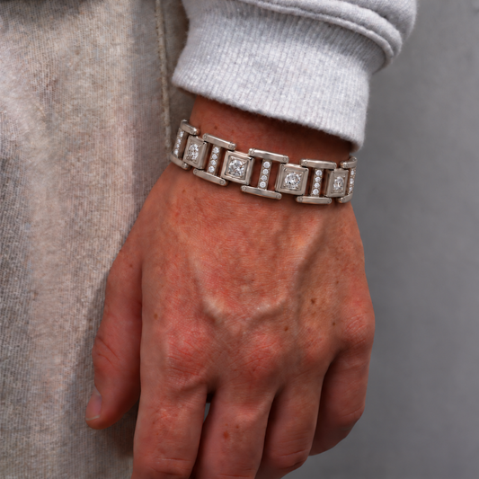 Men's Prism Link Bracelet worn on wrist featuring polished silver-tone rectangular links